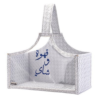 شنطة باليد مصنوعة من الجلد باللون الفضي