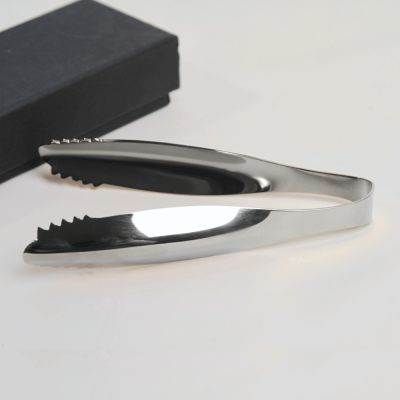 ملقط طعام فاخر من الستانلس ستيل باللون الفضي اللامع