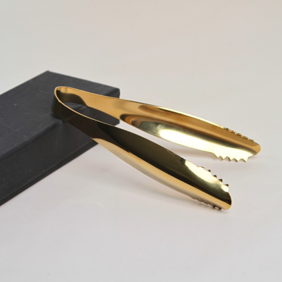 ملقط طعام فاخر من الستانلس ستيل باللون الذهبي اللامع