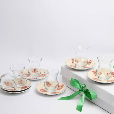 طقم استكانات شاي عدد 6 مع صحون بورسلين بتصميم ود ديزاين