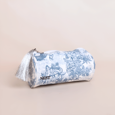 شنطة مستحضرات التجميل بطبعة الجزيرة  - أزرق